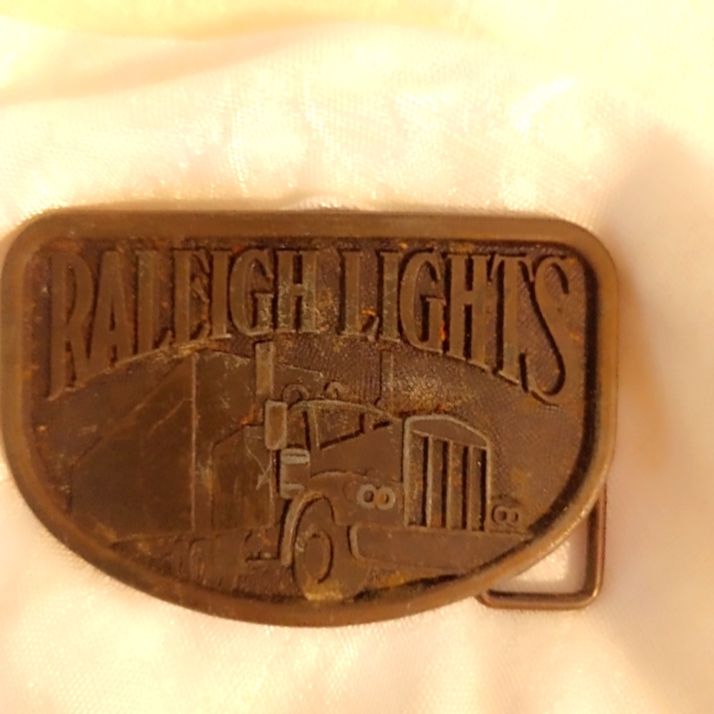Raleigh Lights Trucking belt buckle 1970s Vintage